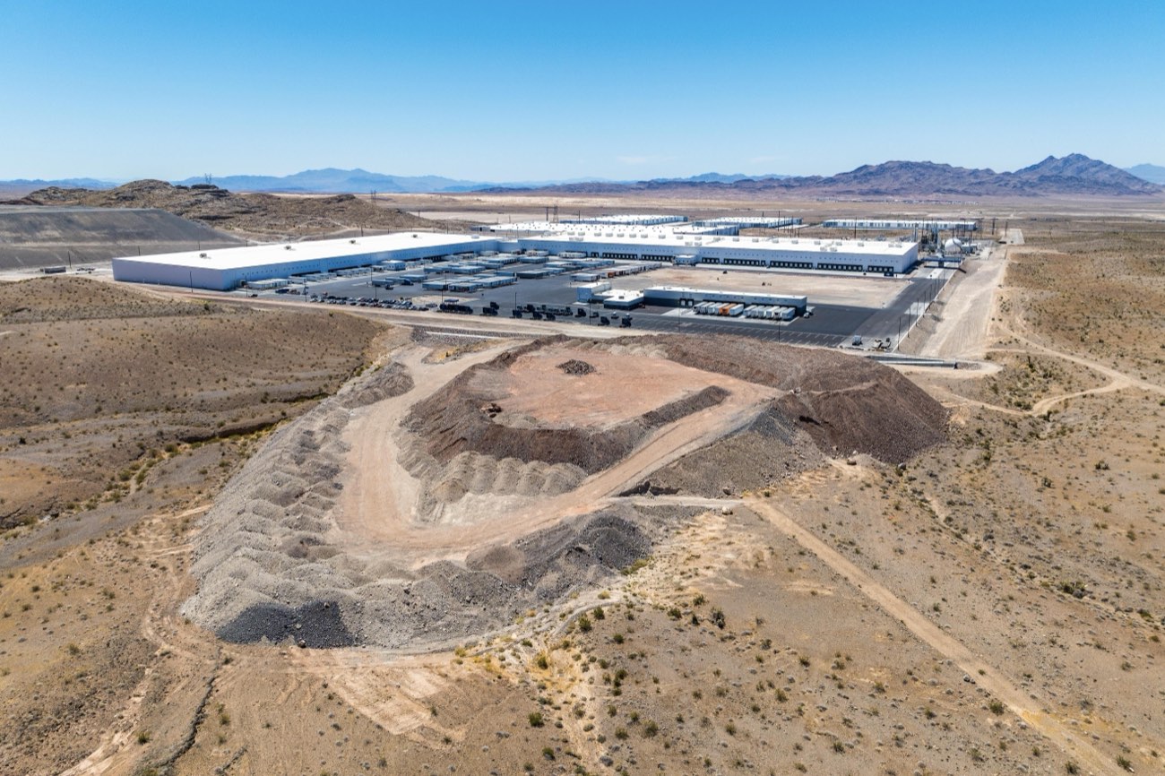 Land parcel aerial with mountain backdrop